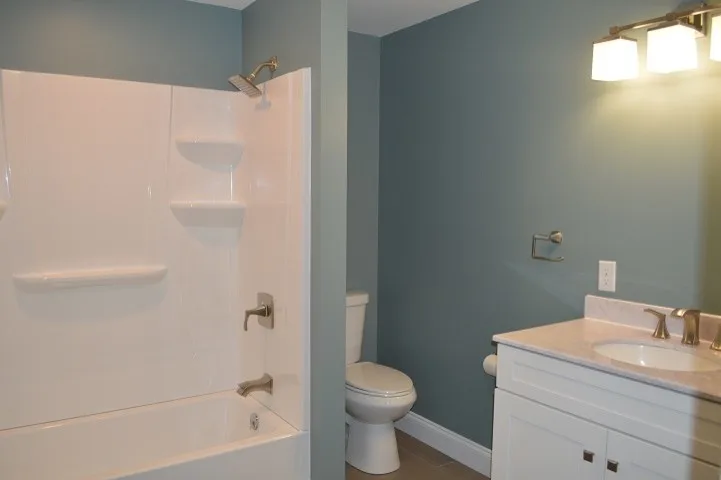 Bathroom and Laundry Space in Apartment by Crossroads Construction - Photo 3