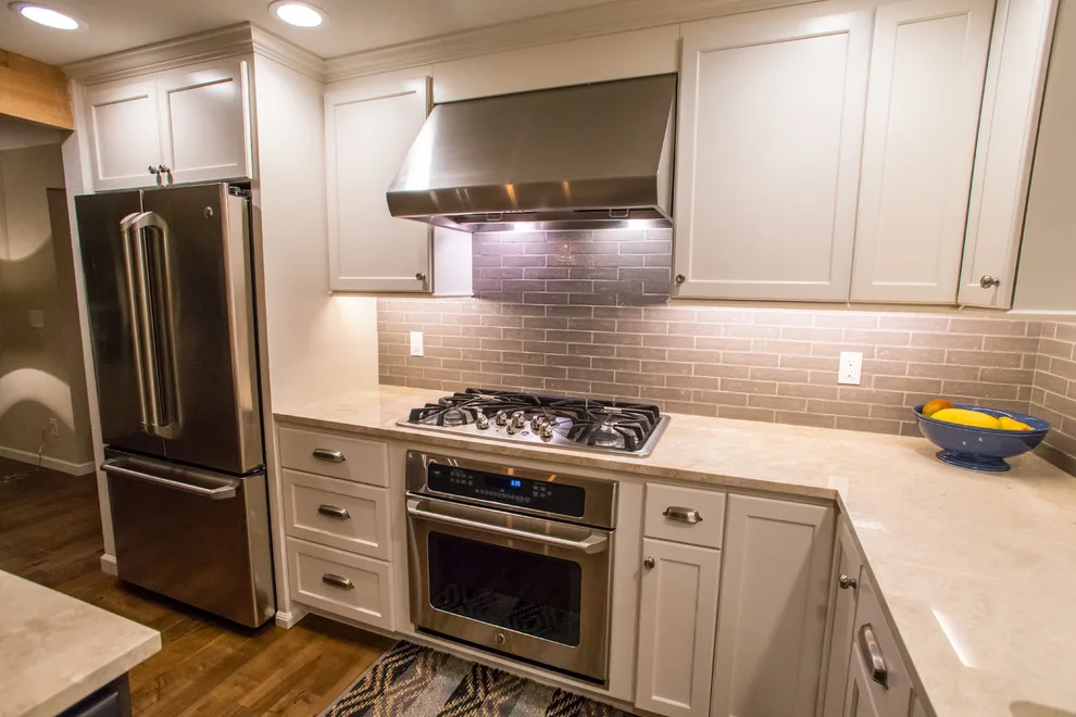 Elegant Transitional Renovation: Kitchen, Powder Room, Living/Dining Area & Entryway by RCW Construction - Photo 10