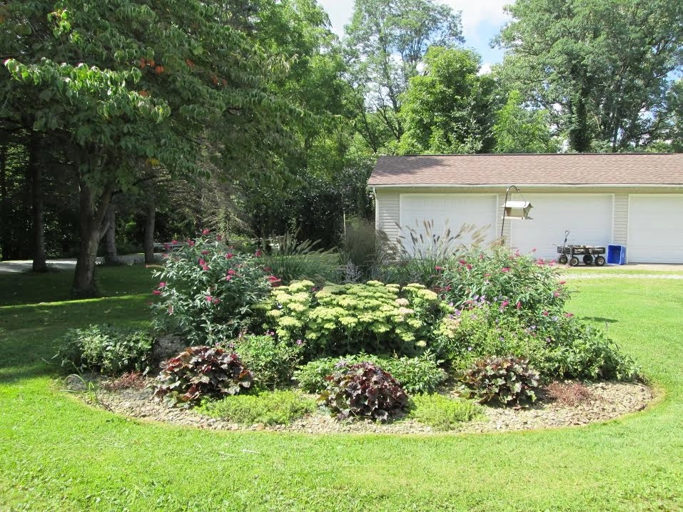 Landscaping with Stone For Clean Look by Greenscape Lawn And Garden Service, In - Photo 2