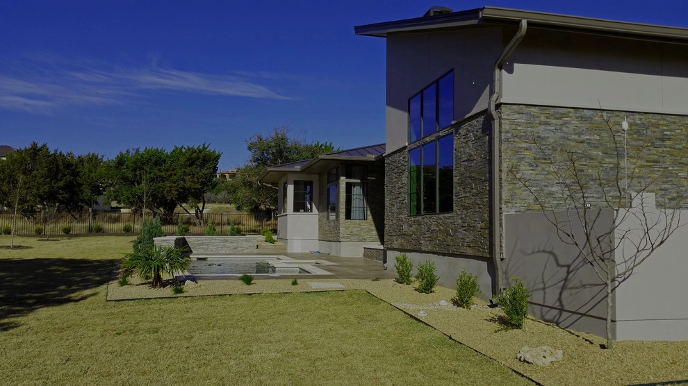 Contemporary Front and Back Yard Landscape in Austin by GreenScapes Landscaping & Pools - Photo 6