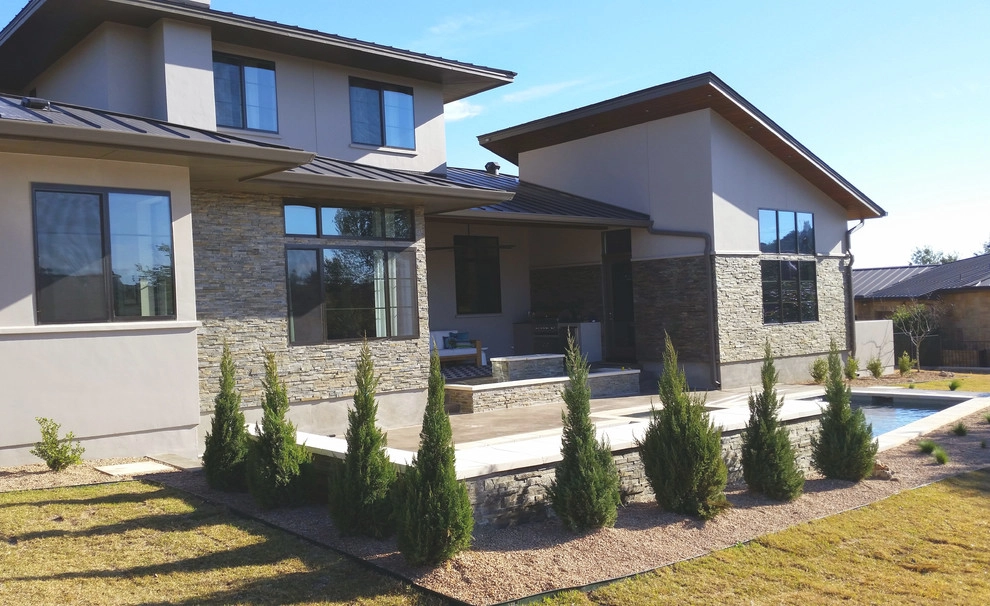 Contemporary Front and Back Yard Landscape in Austin by GreenScapes Landscaping & Pools - Photo 3