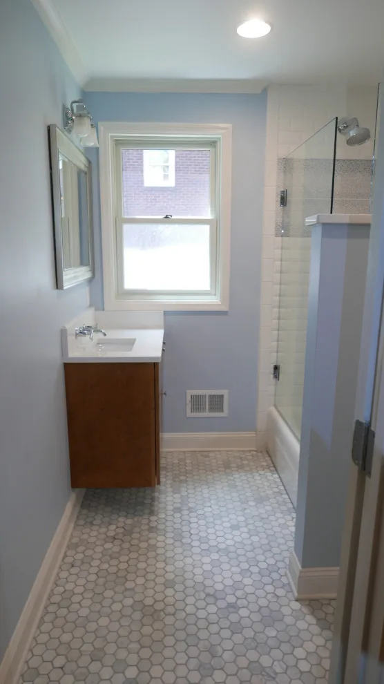 Avon Hall Restroom by Before And After Builders, Inc. - Photo 9