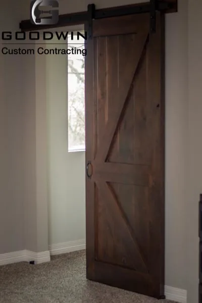 Basement Finishing with Barn Door Design by Goodwin Custom Contracting - Photo 5
