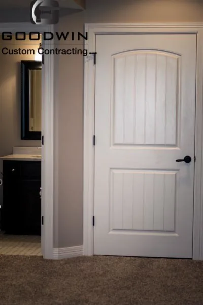 Basement Finishing with Barn Door Design by Goodwin Custom Contracting - Photo 9