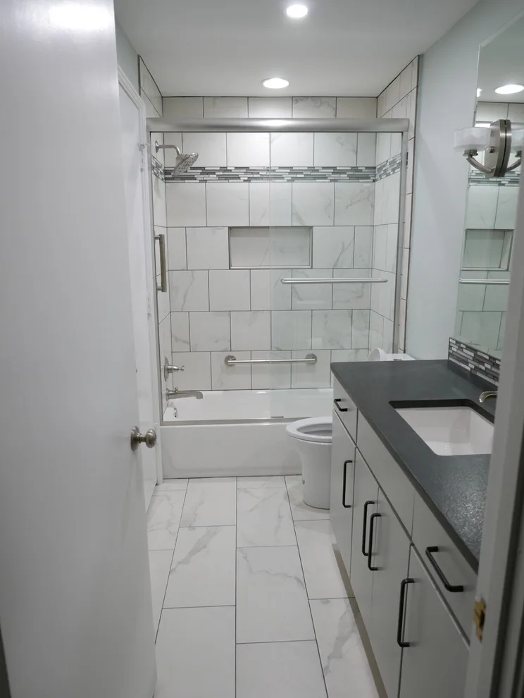 Baronne Hall Restroom by Before And After Builders, Inc. - Photo 4