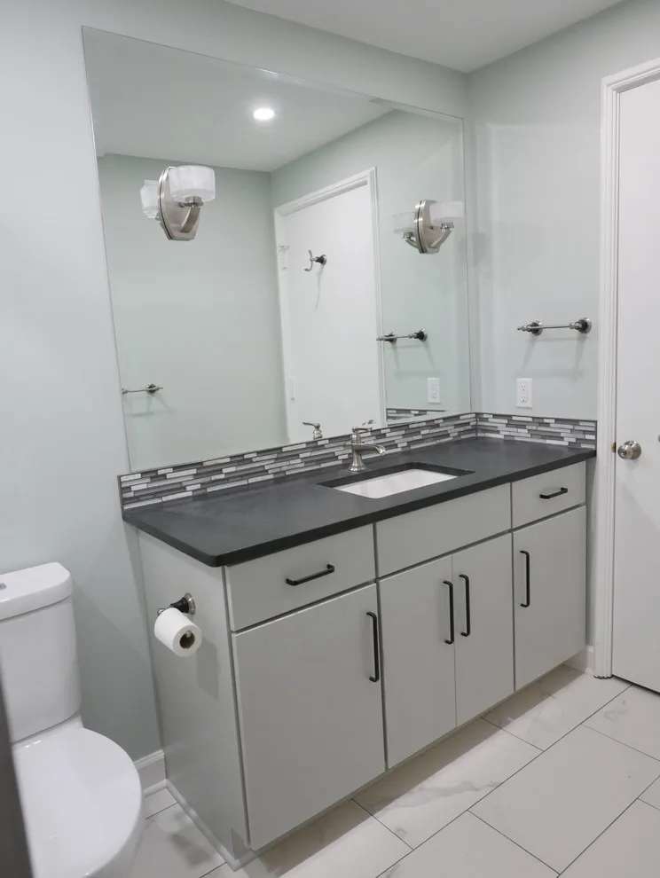 Baronne Hall Restroom by Before And After Builders, Inc. - Photo 6