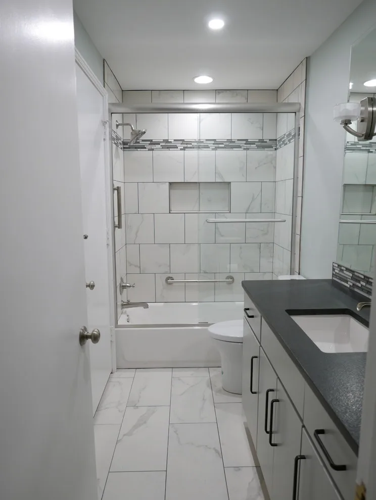 Baronne Hall Restroom by Before And After Builders, Inc. - Photo 2