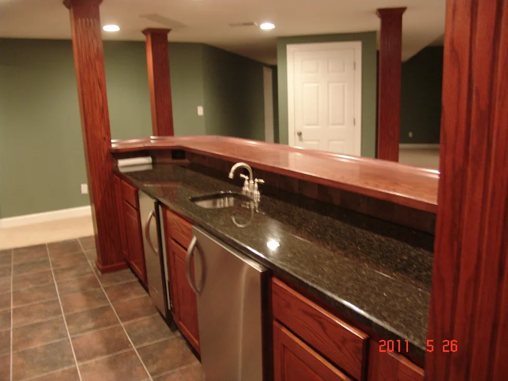 Basement Home Bar Images by Pro Basement Inc. - Photo 12