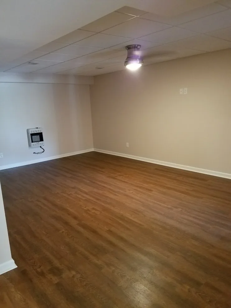 Basement renovation featuring a bar by Southerland Construction & Renovation, LLC - Photo 3