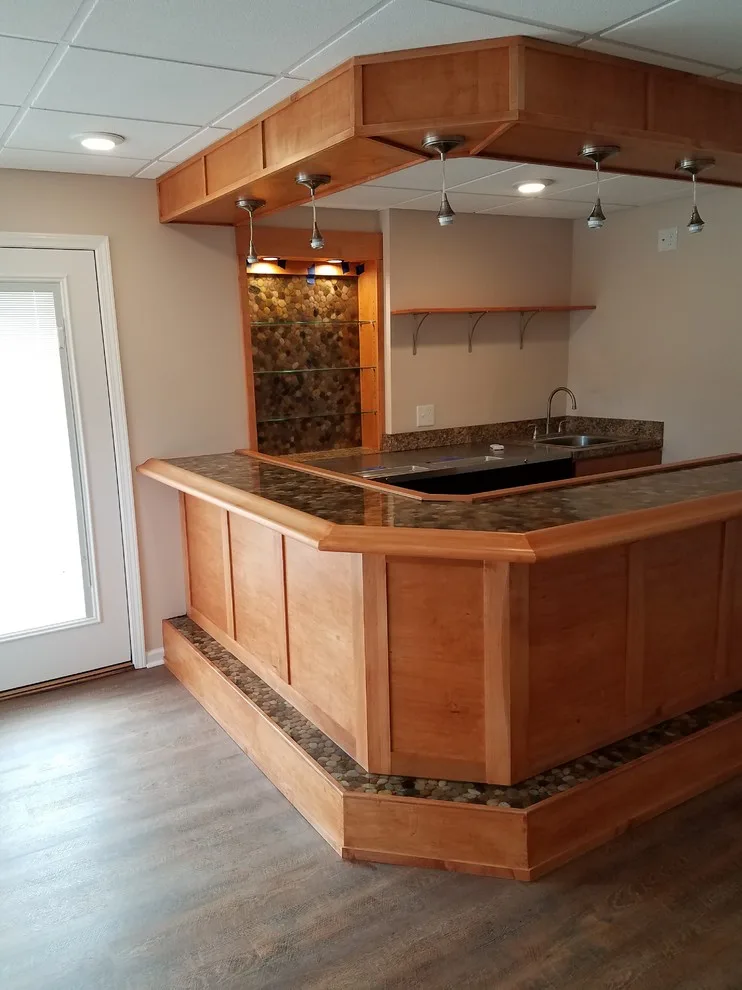 Basement renovation featuring a bar by Southerland Construction & Renovation, LLC - Photo 9