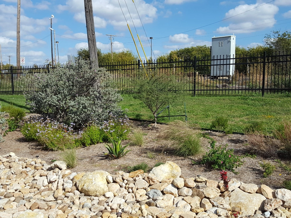 Drought tolerant landscaping with dry creek bed by Happy Gardens - Photo 12
