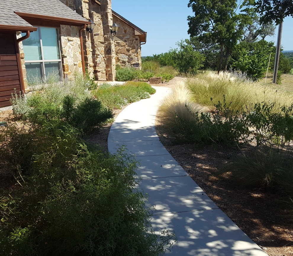 Front yard xeriscape by Happy Gardens - Photo 7