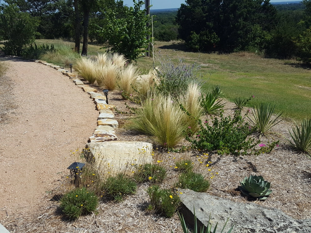 Front yard xeriscape by Happy Gardens - Photo 9