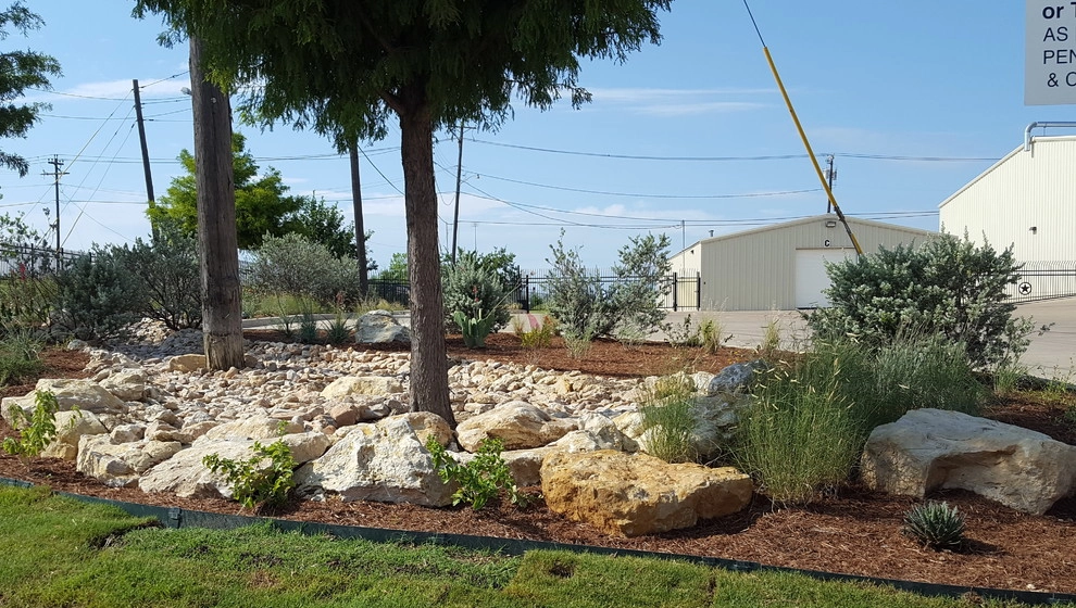 Drought tolerant landscaping with dry creek bed by Happy Gardens - Photo 17