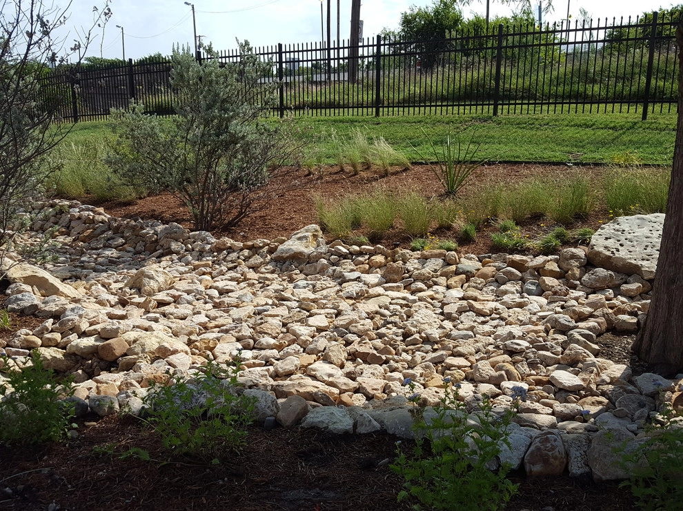 Drought tolerant landscaping with dry creek bed by Happy Gardens - Photo 23