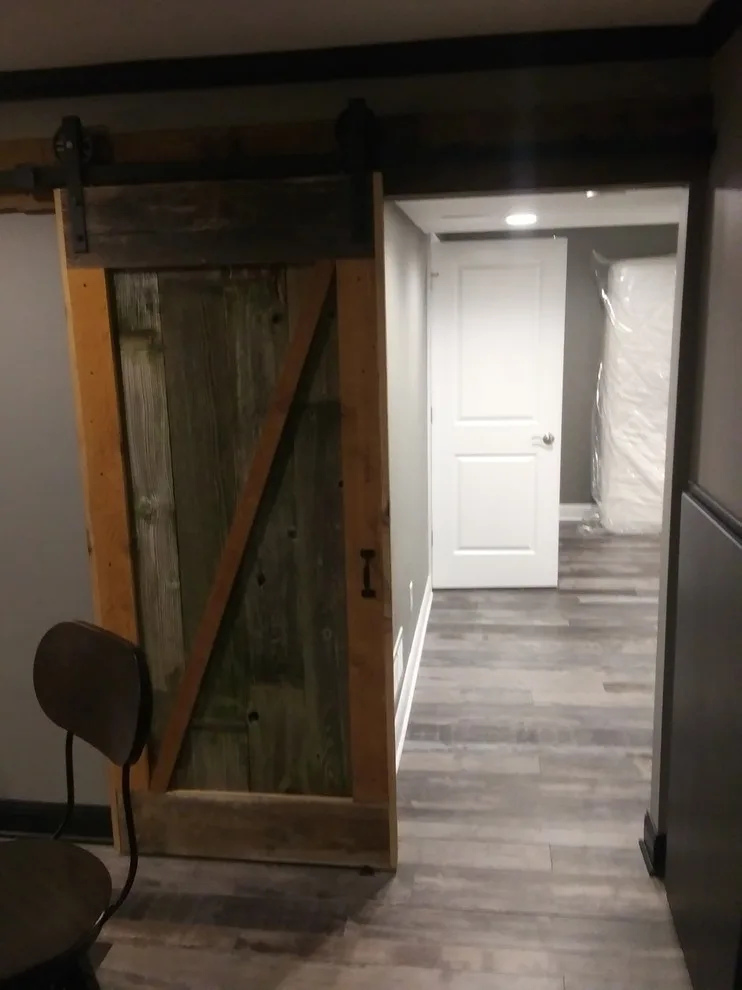 Basement Industrial Aesthetic by Rivermark Builders, LLC - Photo 4
