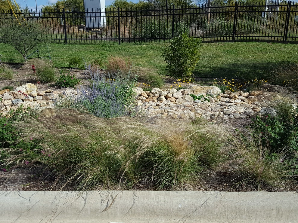 Drought tolerant landscaping with dry creek bed by Happy Gardens - Photo 21