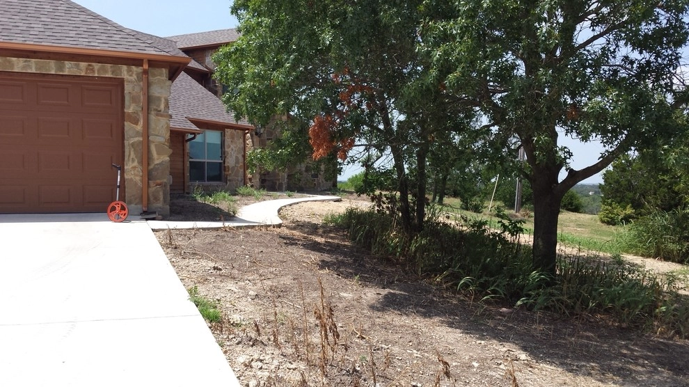 Front yard xeriscape by Happy Gardens - Photo 14