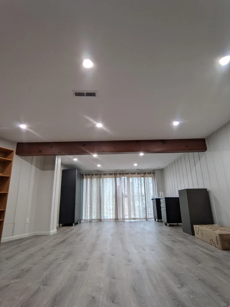 Butler Building's Tailored Basement Renovation by Butler Building & Restoration LLC - Photo 7