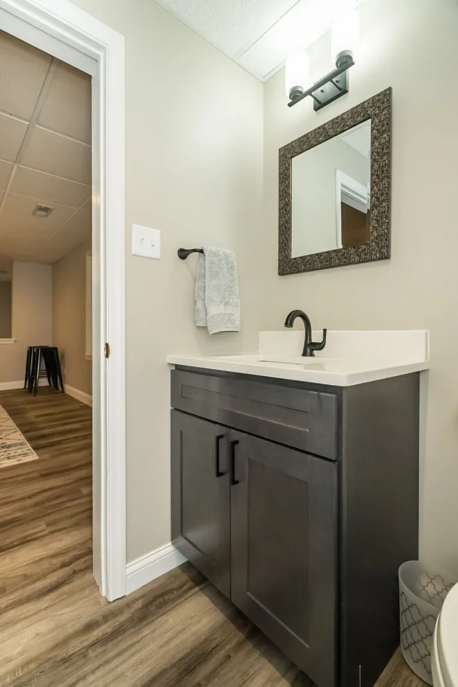 Basement Renovation with Additional Half Bathroom by Lakeside Renovation & Design - Photo 3