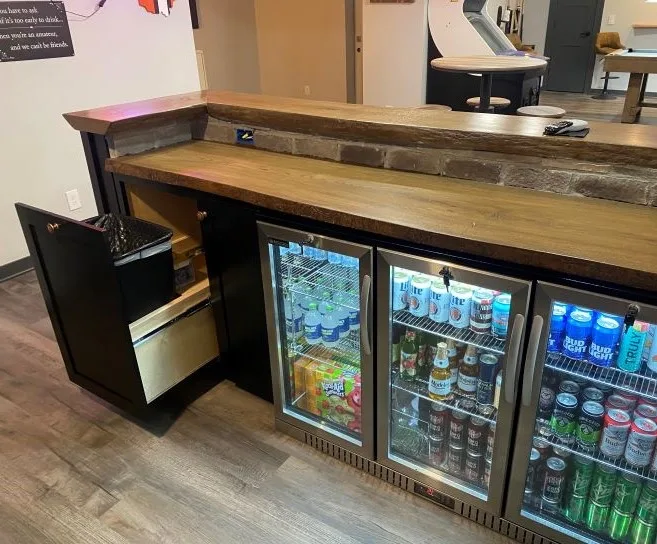 Basement Renovation featuring a bar and game area by Casino Co. Renovations - Photo 7