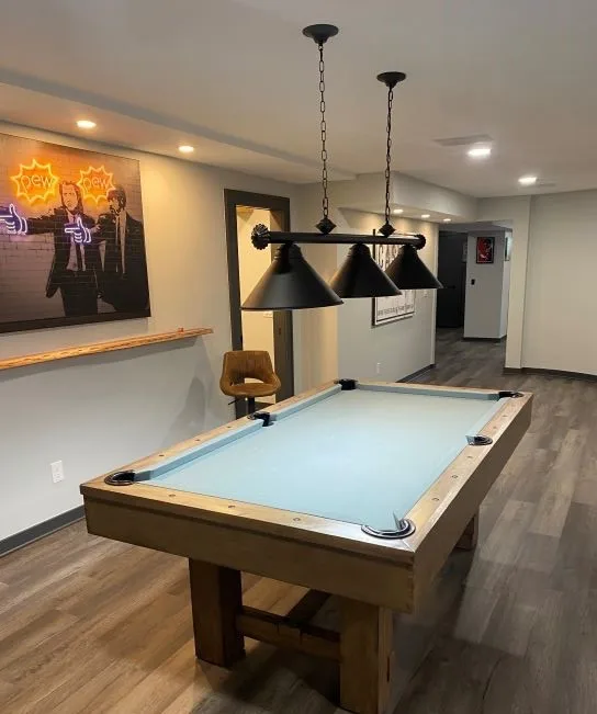 Basement Renovation featuring a bar and game area by Casino Co. Renovations - Photo 12
