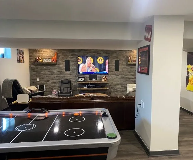 Basement Renovation featuring a bar and game area by Casino Co. Renovations - Photo 8