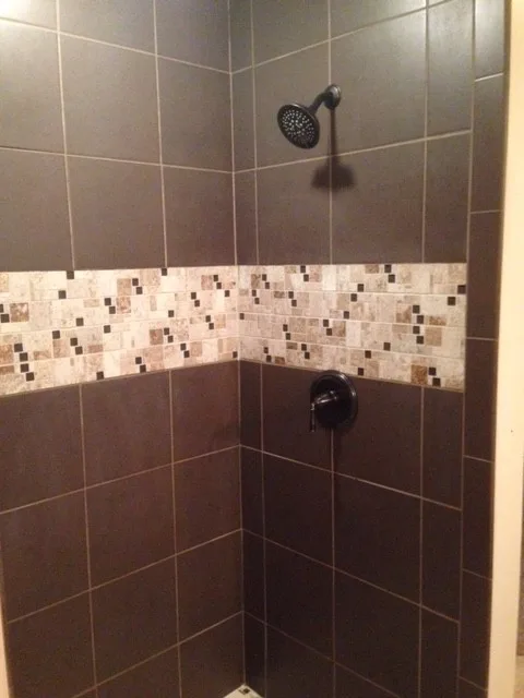 Shower tile for the basement by Home Preservation Specialists Inc - Photo 3