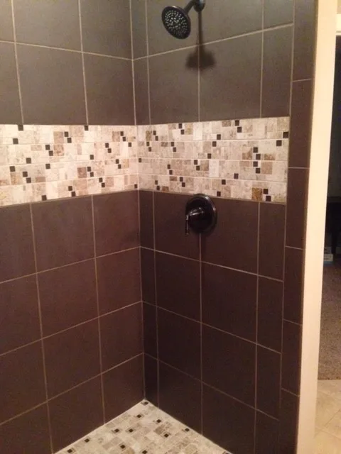 Shower tile for the basement by Home Preservation Specialists Inc - Photo 2
