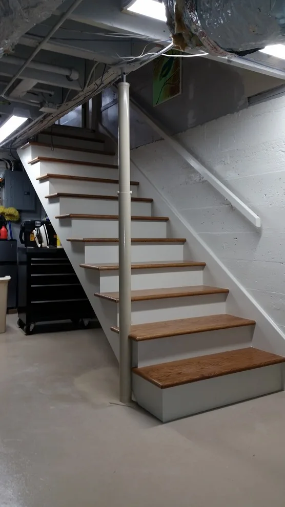 Lower level staircase by Aikins Custom Woodwork - Photo 2