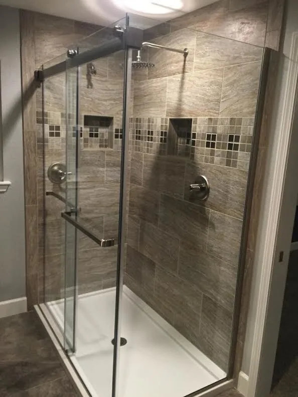 Multiple Bathroom Renovations by Twin Lakes Woodworking & Remodeling - Photo 27