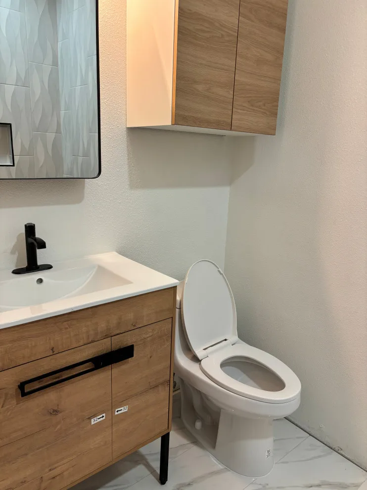 Contemporary Powder Room Renovation - Allendale by PICASSO Design And Remodeling LLC. - Photo 6