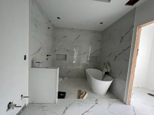 Restroom Renovations by One Stop Construction - Photo 29