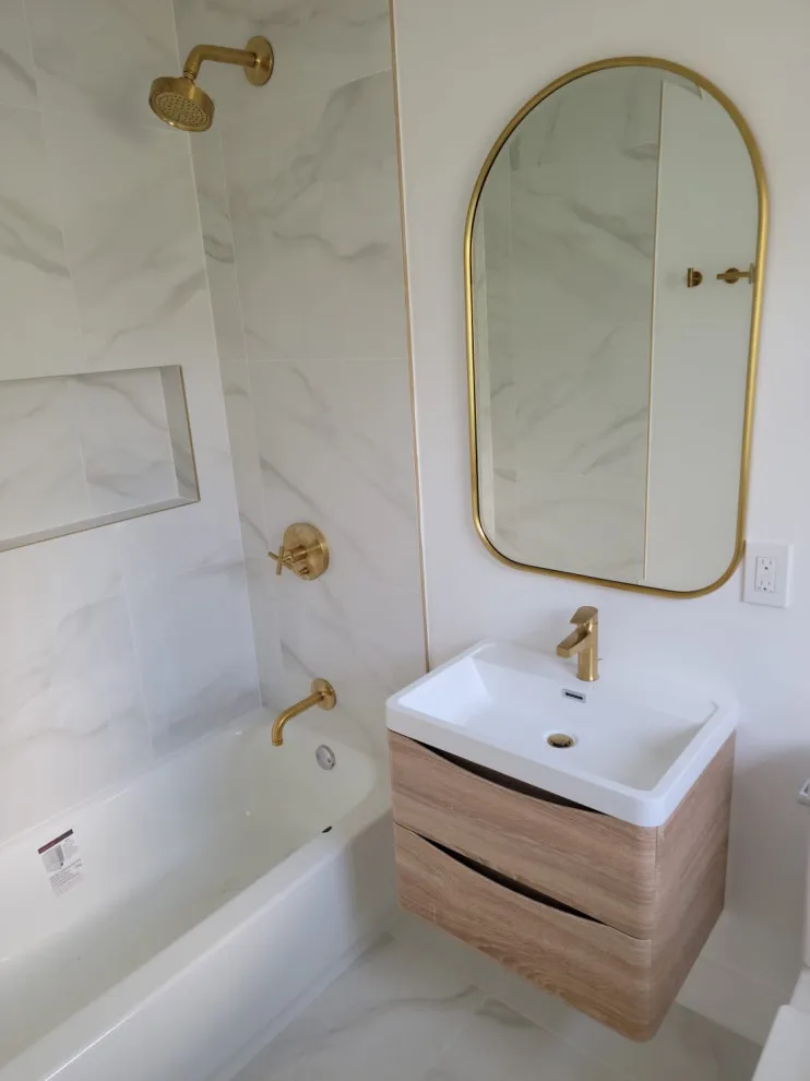 Restroom Renovations by One Stop Construction - Photo 35