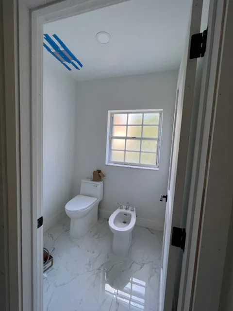 Restroom Renovations by One Stop Construction - Photo 13