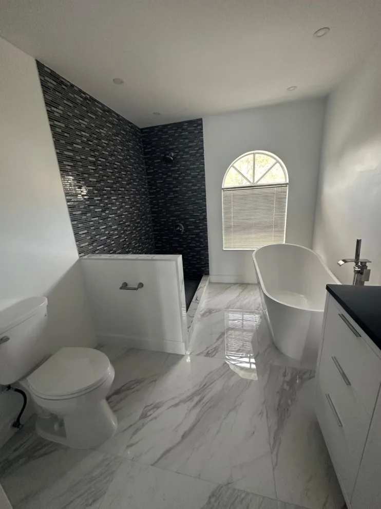 Restroom Renovations by One Stop Construction - Photo 45