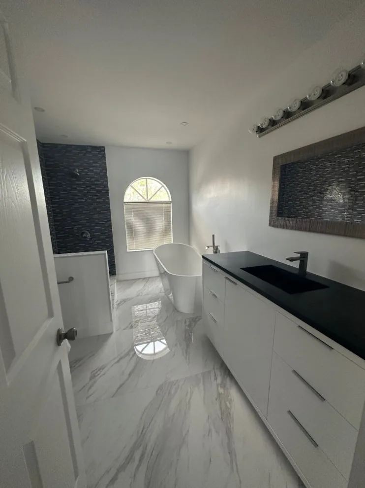 Restroom Renovations by One Stop Construction - Photo 54