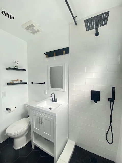 Restroom Renovations by One Stop Construction - Photo 33
