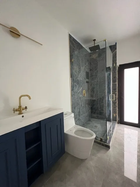 Restroom Renovations by One Stop Construction - Photo 39
