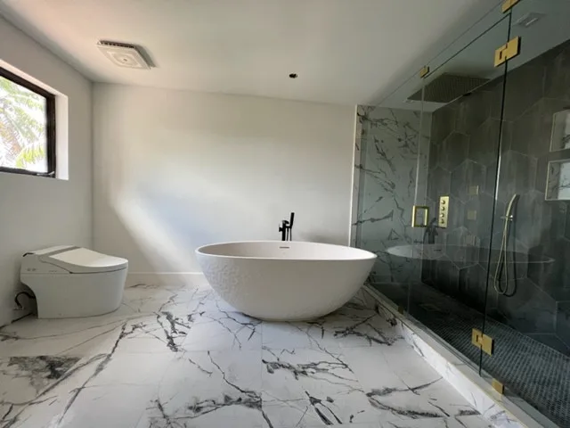 Restroom Renovations by One Stop Construction - Photo 31