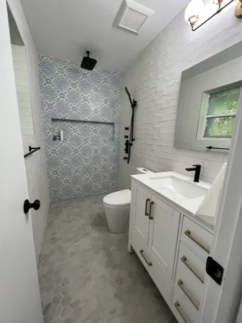 Restroom Renovations by One Stop Construction - Photo 23