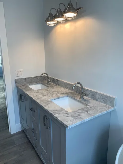 Restroom Renovations by One Stop Construction - Photo 56