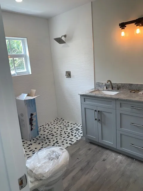 Restroom Renovations by One Stop Construction - Photo 42