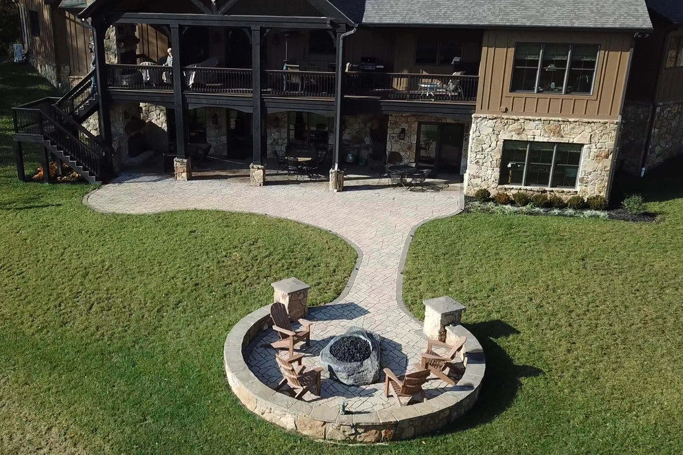 Patio, Custom fire boulder, Seat wall and landscape by Heath Outdoor - Photo 8