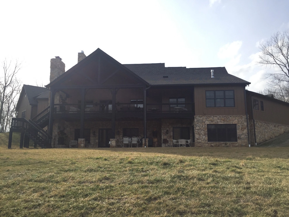 Patio, Custom fire boulder, Seat wall and landscape by Heath Outdoor - Photo 2