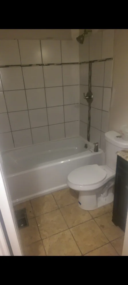 Restroom Renovation by Construction One - Photo 24