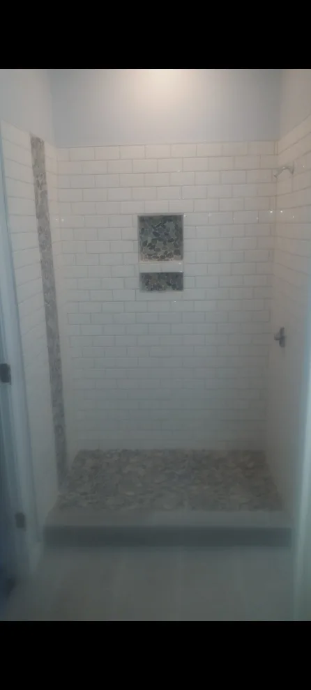 Restroom Renovation by Construction One - Photo 15