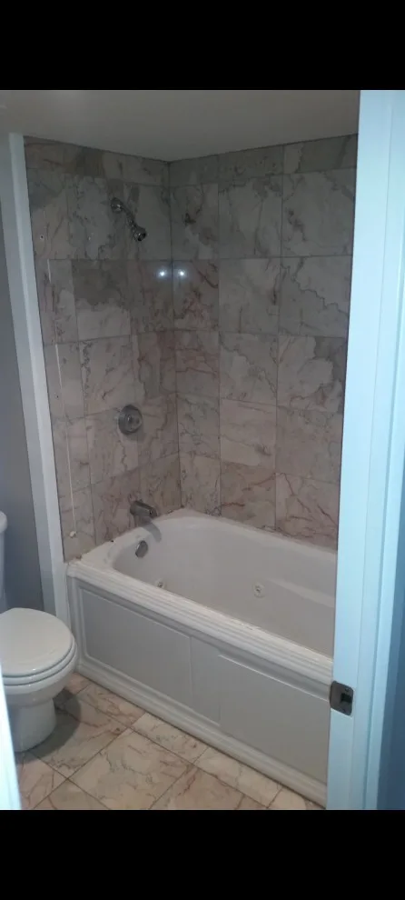 Restroom Renovation by Construction One - Photo 18