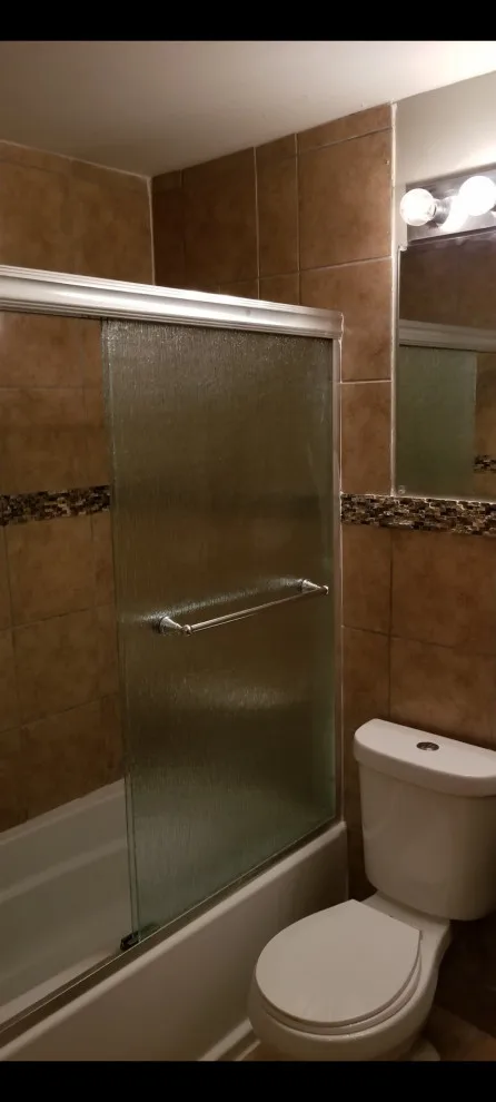 Restroom Renovation by Construction One - Photo 9