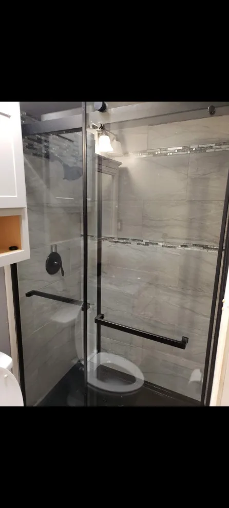 Restroom Renovation by Construction One - Photo 10